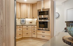 Kitchen,Interior,With,Butcher,Block,Countertops,Penny,Tile,Stainless,Appliances